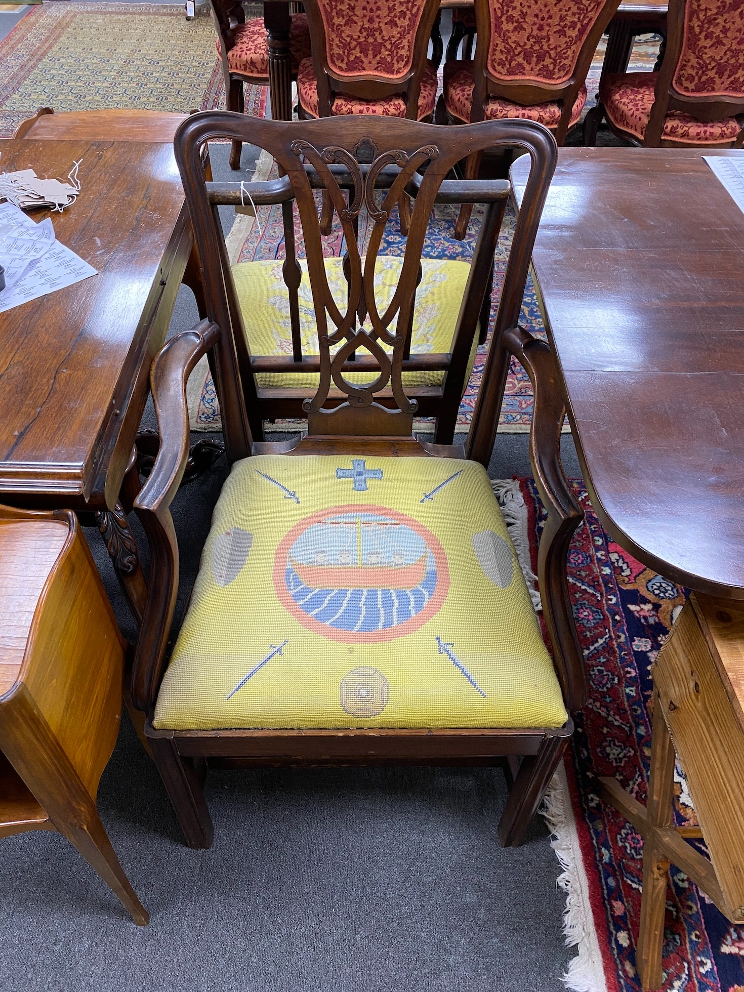 A Chippendale style mahogany carver and a Hepplewhite style mahogany carver